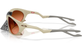 Päikeseprillid OAKLEY Plantaris Matte Sand Prizm Brown Gradient