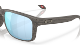 Päikeseprillid OAKLEY Holbrook XXL Woodgrain Prizm Deep Water Polarized