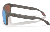 Päikeseprillid OAKLEY Holbrook XXL Woodgrain Prizm Deep Water Polarized