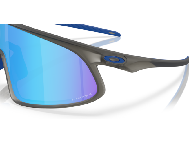 Päikeseprillid OAKLEY RSLV Matte Grey Smoke Prizm Sapphire