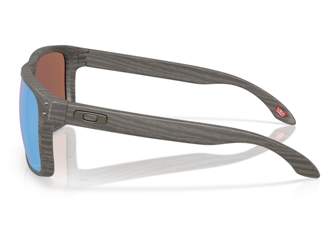 Päikeseprillid OAKLEY Holbrook XXL Woodgrain Prizm Deep Water Polarized